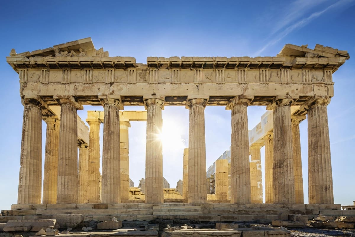 Sunlight shines through the columns of the Parthenon, the main sight of Acropolis tickets in Athens