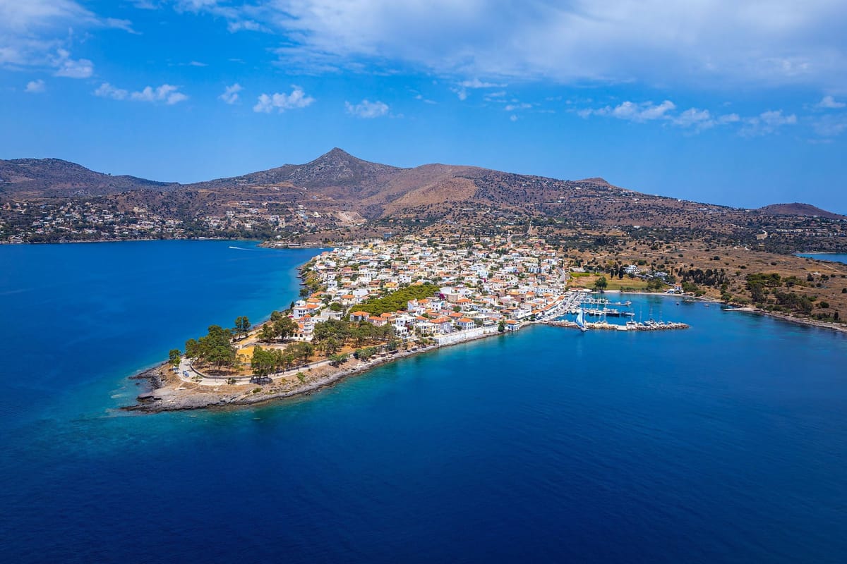 A coastal village on Aegina below the cone of Mount Oros, seen from above on an Aegina day trip