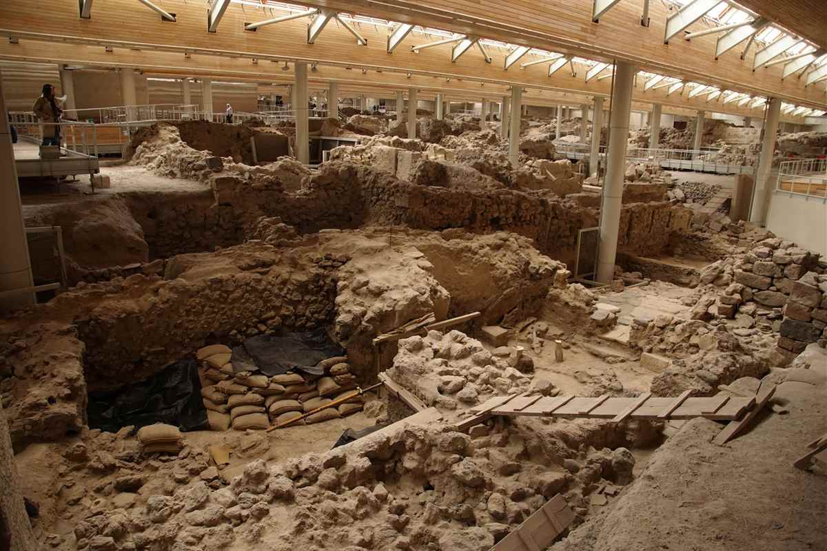 The excavated Bronze Age houses of Akrotiri under the shelter roof on Santorini, the site opened by Akrotiri tickets