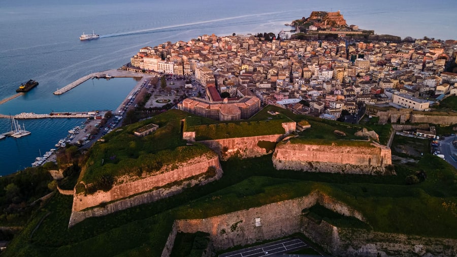 Corfu town between its two fortresses, seen from the air on a Corfu tour