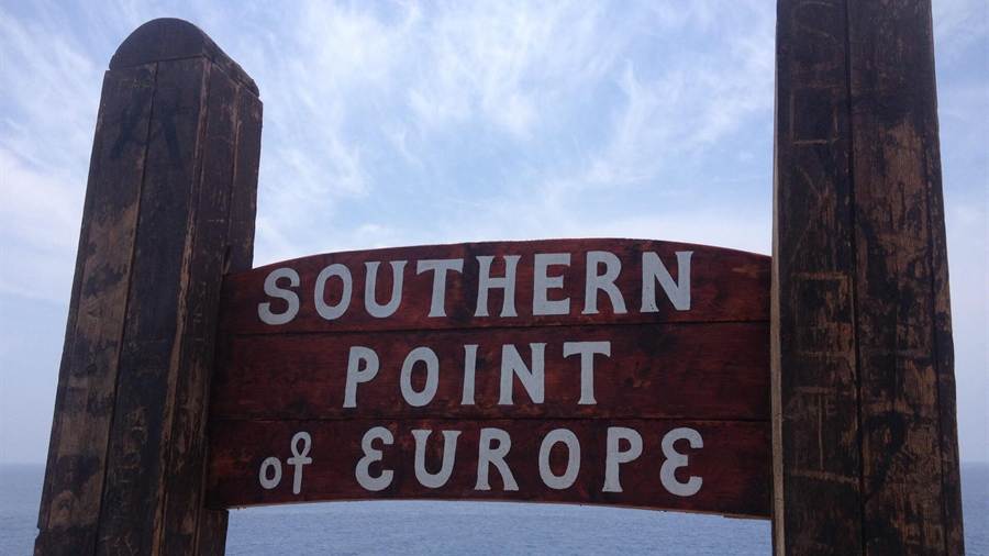 A wooden sign reading Southern Point of Europe at the southern cape of Gavdos, the goal of a Gavdos boat trip