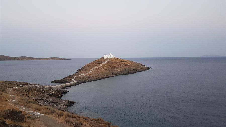 A white chapel above the sea on Kythnos in the western Cyclades