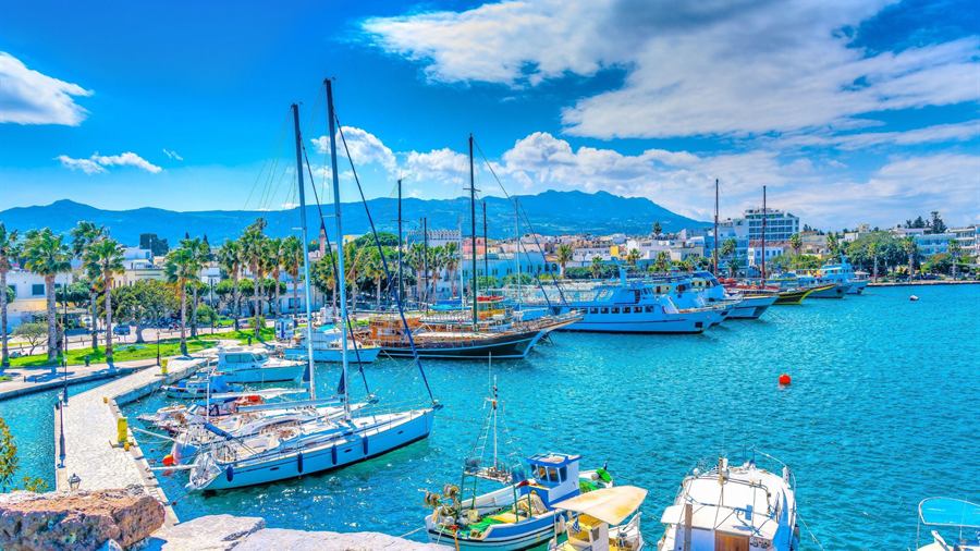 Sailboats and excursion boats in the harbour of Kos town, the starting point of a Kos to Bodrum day trip