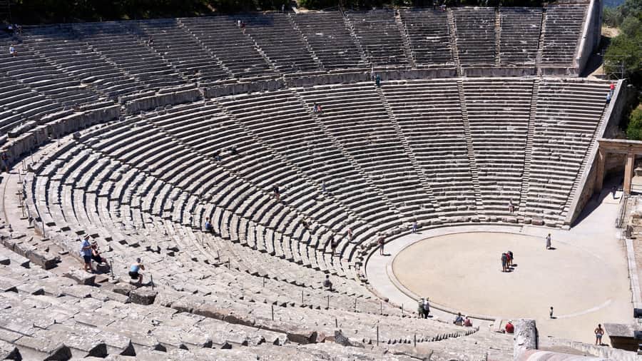 The stone seats of the Great Theatre of Epidaurus, a stop on a Mycenae Epidaurus day trip
