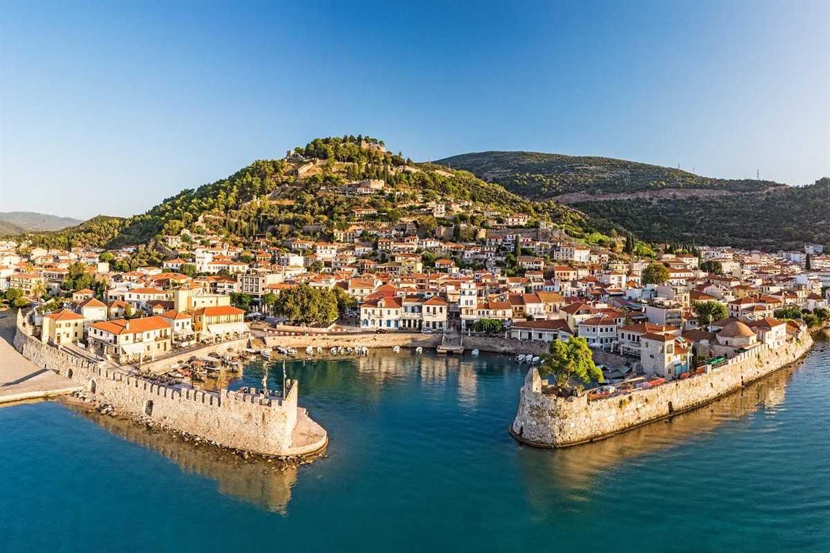 The town of Nafpaktos, its walled harbour and the castle hill seen from above, the setting of a Nafpaktos tour