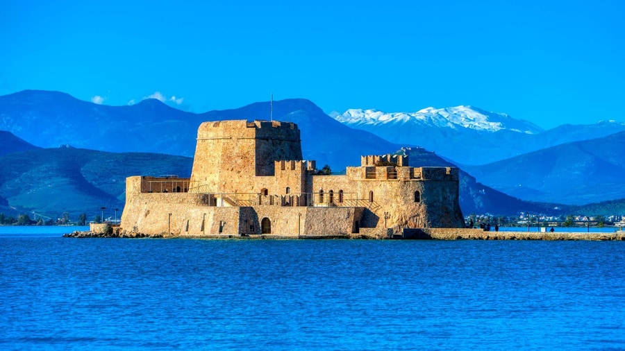 The Bourtzi castle on its islet in the bay, seen on a Nafplio day trip