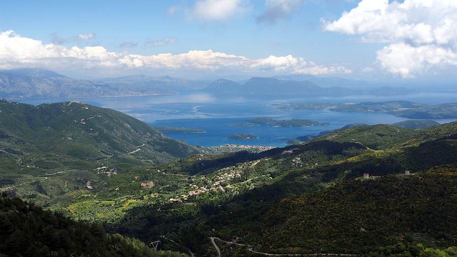 Green hillsides of Lefkada looking over the bay and islands near Nydri