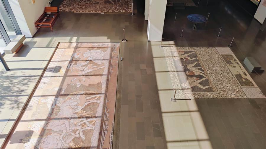 Pebble mosaics laid out in a gallery of the Pella museum, finds seen on a visit to the Pella archaeological site