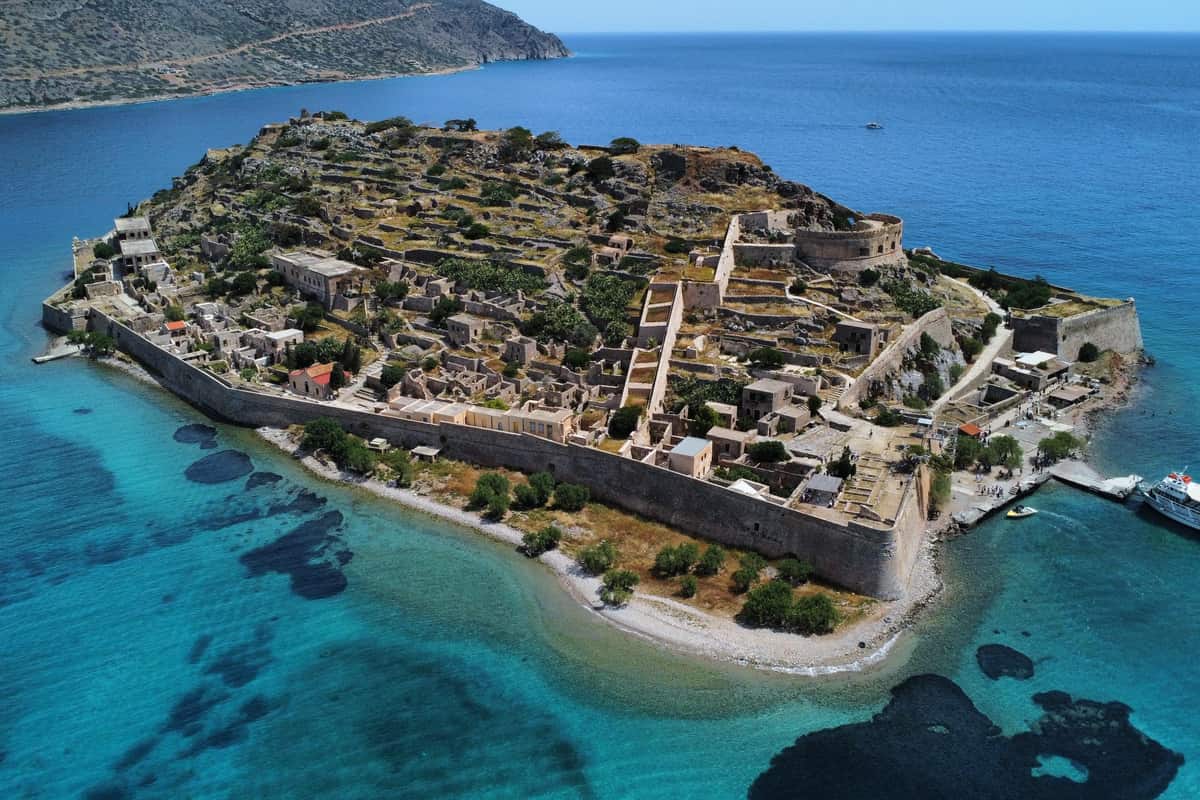 Aerial view of the island of Spinalonga with its Venetian fortress walls, the goal of a Spinalonga tour